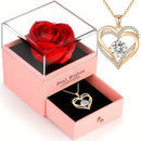 Colar com pingente vermelho e caixa de presente com flor rosa